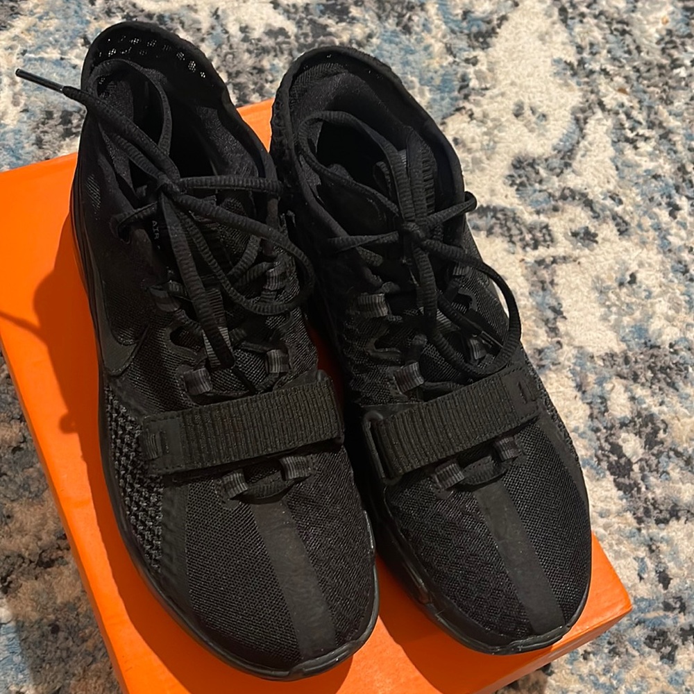 Black Nikes. Worn a couple times. Great condition